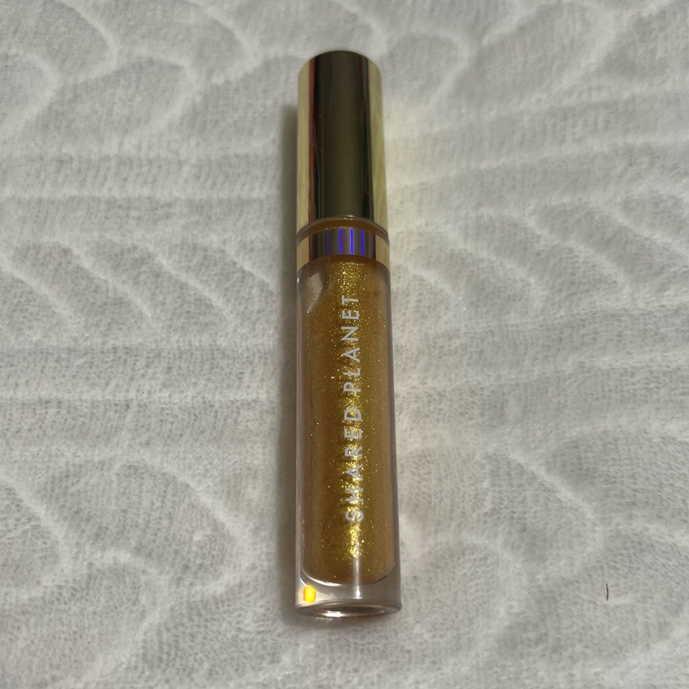 🖤 FREE 🖤‎ Shared Planet - Gold Lip Gloss